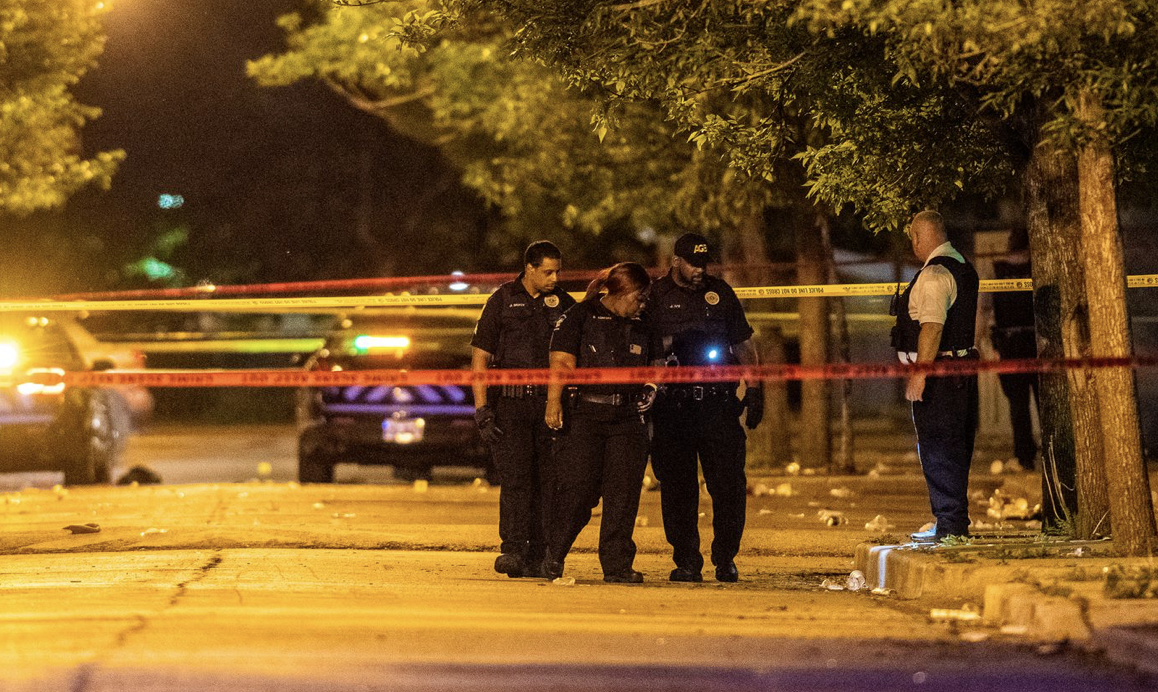 Police cordon off an area as they respond to a shooting near the hollywood. 33 shot, 5 killed so far in Memorial Day weekend gun violence The